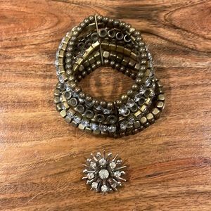 Stretch rhinestone and bronze colored bracelet and pin/pendant